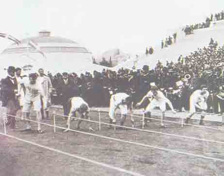 1896 Olympic Games. The sprinters for the 100 Meters are getting ready at the starting point. Those who assumed the classic position which is used today, were considered at least... naive!